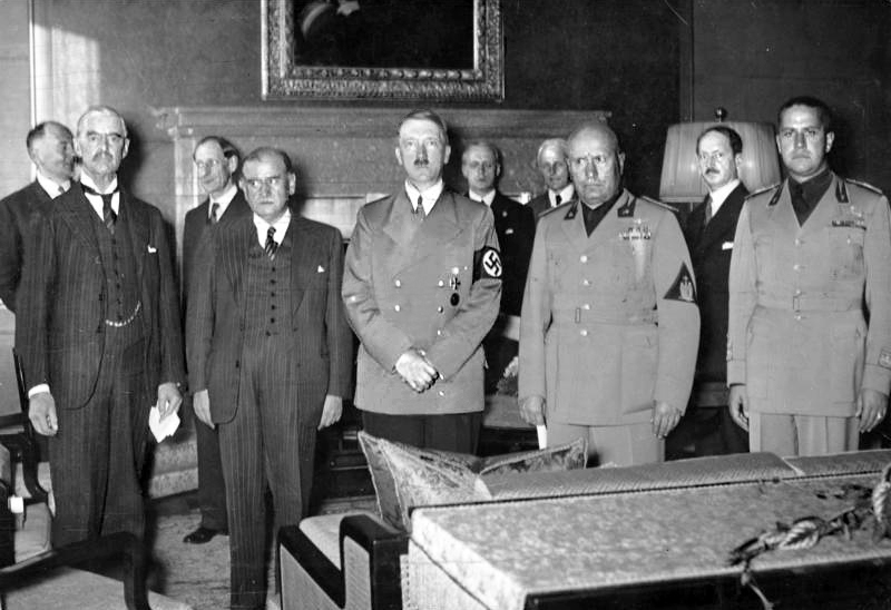 Pictured before signing the Munich Agreement (1938)